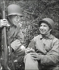 Samuel Stavisky, left, and Alfred Lewis were Washington Post reporters before joining the Marines as combat correspondents during World War II. (USMC Photo)