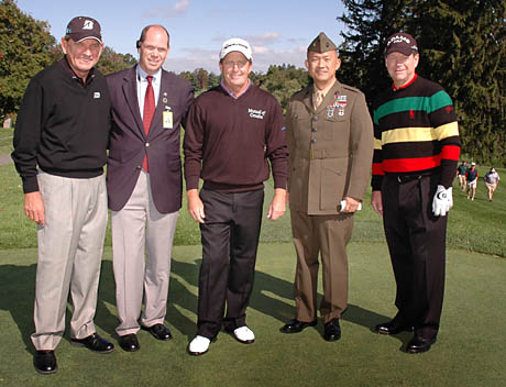 Nick Price, Gary Jones (Golf Director at Baltimore Country Club), Fred Funk, Maj. Danny Chung, and Tom Watson on the first tee at the Constellation Energy Senior Championship on Thursday, Oct. 1, 2009. Service members from DINFOS announced each player as they stepped up to tee off the tournament. (Photo by Susan Pankau of Golfotos)