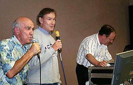 USMCCCA President, Fred Flash Lash and past president Keith Oliver take part in the Kareoke event in the command post at the end of the days activities.