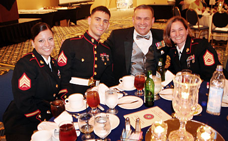 Sgt. Nikki Herman, Cpl. Richard Blumenstein, Walt Ford, editor of Leatherneck Magazine and SSgt Angela Mink enjoy the Merit Awards Banquet.