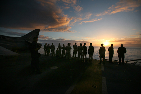 Pictorial Honorable Mention - Cpl. PatrickM. Johnson-Campbell: Marines of 26th Marine Expeditionary Unit, and sailors of  USS Iwo Jima (LHD-7) admire the sunset on flight deck of  Iwo Jima , September 4, 2008. The 26th MEU and the Iwo Jima Expeditionary Strike Group is crossing the Atlantic Ocean during their 2008-2009 deployment.