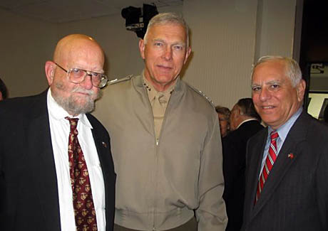 Two USMCCCA members, Mike Rhea (left) and Dave Hugel were among the large audience to greet Commandant James Conway on June 11 at the National Press Club in Washington, D.C. It was the generals second appearance at the Club since becoming commandant. One question asked of the general during his one-hour talk: What would you tell the parents of an 18-year-old son who wanted to join the Marine Corps? Conway (after a slight pause): I would look the mother straight in the eye and tell her theres no safer place in the world than to be with a battalion of United States Marines.  (Photo by USMCCCA member Don Knight).