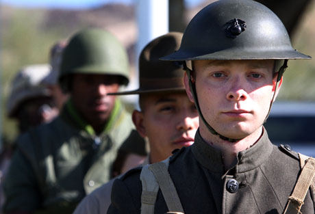 News Photography Honorable Mention - Cpl. Nicole A. Lavine:  MARINE CORPS AIR GROUND COMBAT CENTER TWENTYNINE PALMS, Calif.-Cpl. James Wiggins Jr., a range scheduling plotter with Bearmat range safety, Company A, Headquarters Battalion, waits his turn to march onto Lance Cpl. Torrey L. Gray Field during the Combat Center’s 2008 Birthday Pageant Nov. 3, 2008.