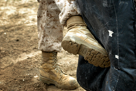 2nd Place Photojournalism by Sgt. James P.Green: Round kicks were one of the techniques used in the course to incorporate hand-to-hand combat along with fatigue. The intent of the course is to push recruits beyond what they believe are their physical limitations.